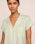 Model is wearing Gisele TENCEL™ Modal Short Sleeve Cropped PJ Set in Mint Cream/Ivory