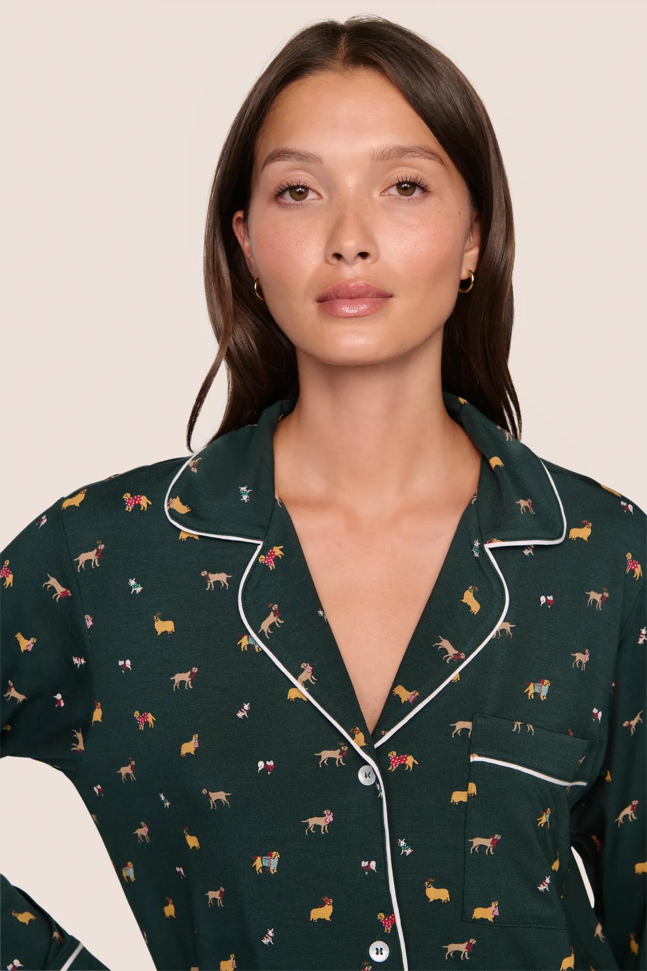 Model is wearing Gisele Printed TENCEL™ Modal Long PJ Set  in Holiday Dogs Pine/Ivory
