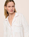 Model is wearing Gisele Printed TENCEL™ Modal Long PJ Set in SummerDaisyWhite/PaleMauve