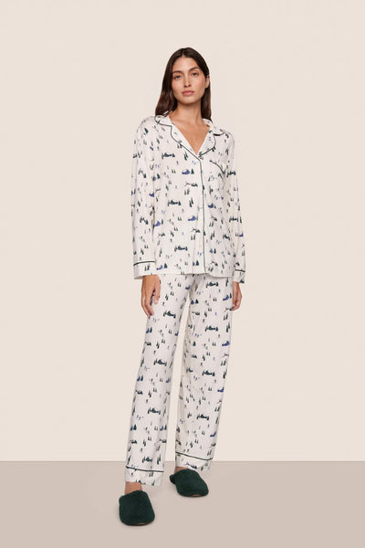 Model is wearing Gisele Printed TENCEL™ Modal Long PJ Set in Ski Chalet Ivory/Pine