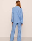 Model is wearing Gisele Printed TENCEL™ Modal Long PJ Set in Nordic Stripes Vista Blue/Iv