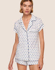Model is wearing Gisele Printed TENCEL™ Modal Shortie Short PJ Set in Hannukah Glow Nouvean Navy/Ny
