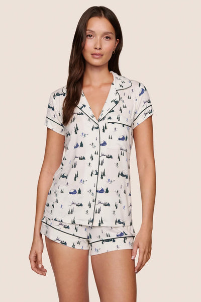 Model is wearing Gisele Printed TENCEL™ Modal Shortie Short PJ Set in Ski Chalet Ivory/Pine