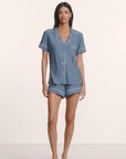 Model is wearing Gisele Printed TENCEL™ Modal Relaxed Short PJ Set in Duo Stripe Slate Blue/Ivory