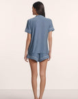 Model is wearing Gisele Printed TENCEL™ Modal Relaxed Short PJ Set in Duo Stripe Slate Blue/Ivory