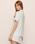 Model is wearing Gisele Printed TENCEL™ Modal Relaxed Short PJ Set in SummerDaisyWhite/PaleMauve