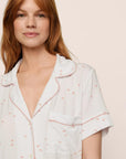 Model is wearing Gisele Printed TENCEL™ Modal Relaxed Short PJ Set in SummerDaisyWhite/PaleMauve