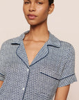 Model is wearing Gisele Printed TENCEL™ Modal Relaxed Short PJ Set in Seashell Navy/Navy