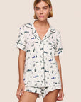 Model is wearing Gisele Printed TENCEL™ Modal Relaxed Short PJ Set in Ski Chalet Ivory/Pine