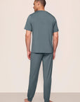 Model is wearing Henry TENCEL™ Modal Short Sleeve & Pant PJ Set in Stone Blue