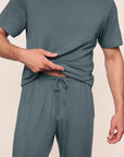 Model is wearing Henry TENCEL™ Modal Short Sleeve & Pant PJ Set in Stone Blue