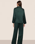 Model is wearing Inez Washable Silk Long PJ Set in Pine/Navy