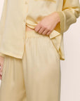 Model is wearing Inez Washable Silk Long PJ Set in Sunshine/White