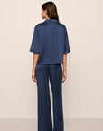 Model is wearing Inez Washable Silk Jacquard Relaxed Wide Leg Pant PJ Set in Navy