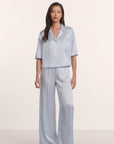 Model is wearing Inez Washable Silk Jacquard Relaxed Wide Leg Pant PJ Set in Powder Blue