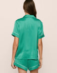 Model is wearing Inez Washable Silk Short PJ Set in  Oasis Green/White