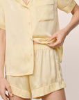 Model is wearing Inez Washable Silk Short PJ Set in Sunshine/White