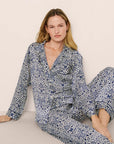 Model is wearing Inez Washable Silk Printed Long PJ Set in Azulejos Navy/Navy