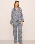 Model is wearing Inez Washable Silk Printed Long PJ Set in Azulejos Navy/Navy
