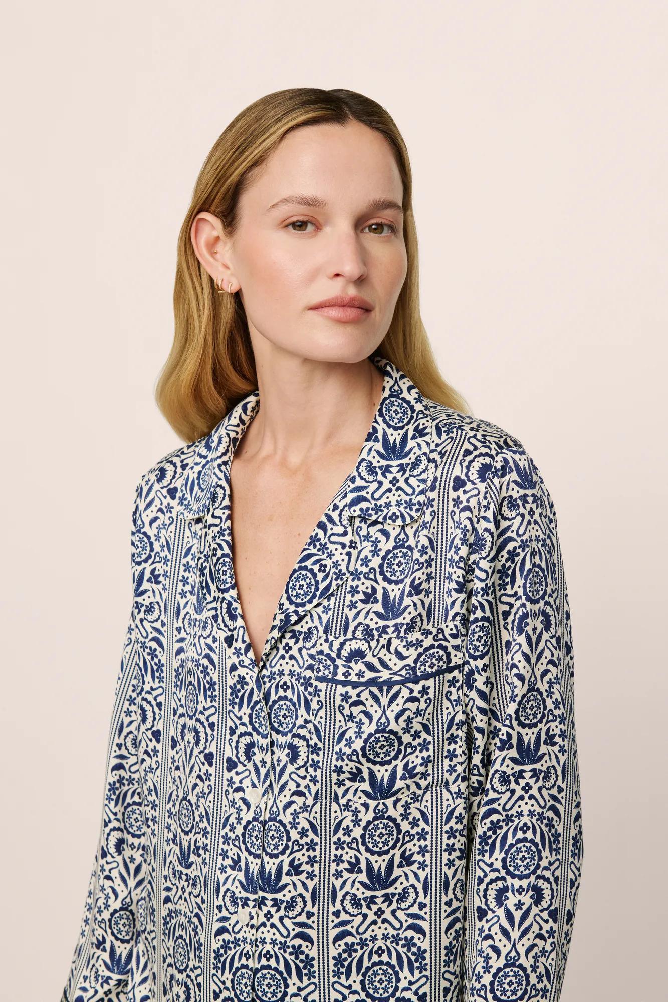 Model is wearing Inez Washable Silk Printed Long PJ Set in Azulejos Navy/Navy