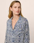 Model is wearing Inez Washable Silk Printed Long PJ Set in Azulejos Navy/Navy