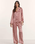 Model is wearing Inez Washable Silk Printed Long PJ Set in Bloomscape Misty Rose/Mesa Rose