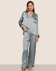 Model is wearing Inez Washable Silk Printed Long PJ Set in Classic Stripe Lead/Ivory