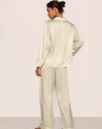 Model is wearing Inez Washable Silk Printed Long PJ Set in Foliage Mint Cream/Ivory