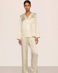 Model is wearing Inez Washable Silk Printed Long PJ Set in Foliage Mint Cream/Ivory