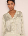 Model is wearing Inez Washable Silk Printed Long PJ Set in Foliage Mint Cream/Ivory