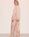 Model is wearing Inez Washable Silk Printed Long PJ Set in Geosphere Silver Pink/Silverpi