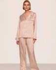 Model is wearing Inez Washable Silk Printed Long PJ Set in Geosphere Silver Pink/Silverpi