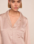 Model is wearing Inez Washable Silk Printed Long PJ Set in Geosphere Silver Pink/Silverpi