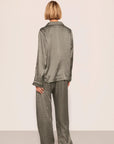 Model is wearing Inez Washable Silk Printed Long PJ Set in Petite Batik Smokeyolive/Ivory