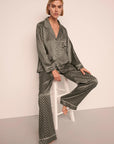 Model is wearing Inez Washable Silk Printed Long PJ Set in Petite Batik Smokeyolive/Ivory