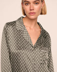 Model is wearing Inez Washable Silk Printed Long PJ Set in Petite Batik Smokeyolive/Ivory