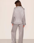 Model is wearing Inez Washable Silk Printed Long PJ Set in Tile Square Gray Dawn/Navy