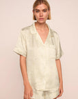 Model is wearing Inez Washable Silk Printed Short PJ Set in Foliage Mint Cream/Ivory