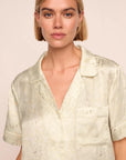 Model is wearing Inez Washable Silk Printed Short PJ Set in Foliage Mint Cream/Ivory