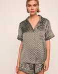 Model is wearing Inez Washable Silk Printed Short PJ Set in Petite Batik Smokeyolive/Ivory