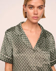 Model is wearing Inez Washable Silk Printed Short PJ Set in Petite Batik Smokeyolive/Ivory
