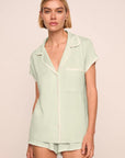 Model is wearing Frida TENCEL™ Modal Shortie Short PJ Set in Mint Cream/Ivory