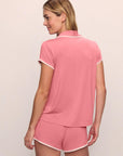 Model is wearing Frida TENCEL™ Modal Shortie Short PJ Set in Sunkissed Coral/Ivory