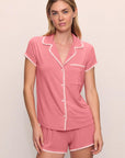Model is wearing Frida TENCEL™ Modal Shortie Short PJ Set in Sunkissed Coral/Ivory