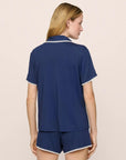 Model is wearing Frida TENCEL™ Modal Relaxed Short PJ Set in Navy/Ivory