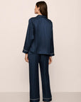 Model is wearing Inez Washable Silk Jacquard Long PJ Set in ClassicStripeJacquardNv/Iv