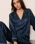 Model is wearing Inez Washable Silk Jacquard Long PJ Set in ClassicStripeJacquardNv/Iv