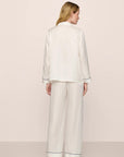 Model is wearing Inez Washable Silk Jacquard Long PJ Set in ClassicStripeJacquardPea/Na