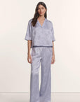 Model is wearing Inez Washable Silk Jacquard Relaxed Wide Leg Pant PJ Set in Rose Garden Lavender Dusk