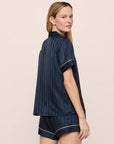 Model is wearing Inez Washable Silk Jacquard Short PJ Set in ClassicStripeJacquardNv/Iv